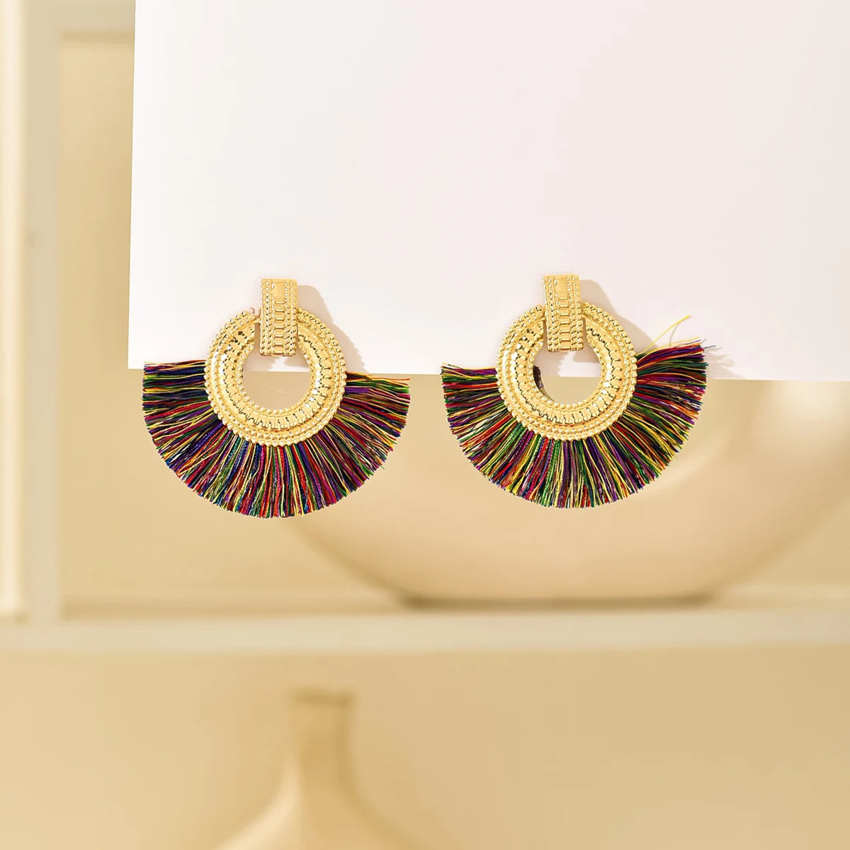 Boucles d'oreilles égyptiennes en éventail brossé