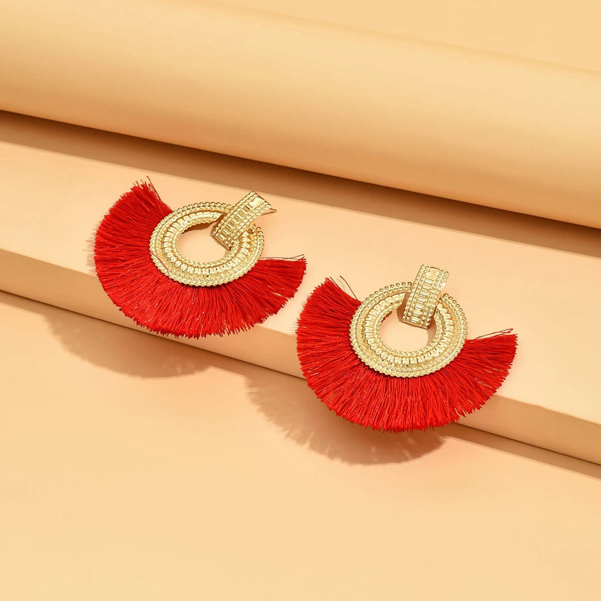Boucles d'oreilles égyptiennes en éventail brossé