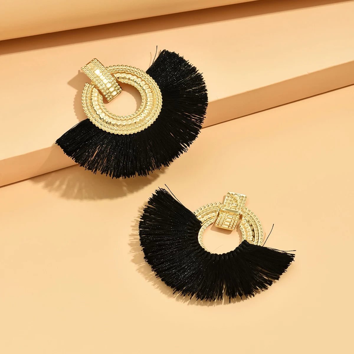 Boucles d'oreilles égyptiennes en éventail brossé